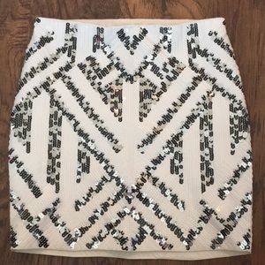 White sequined Express tube skirt.
